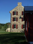 Maryland Farmhouse View of North Elevation with New Garage in Foreground